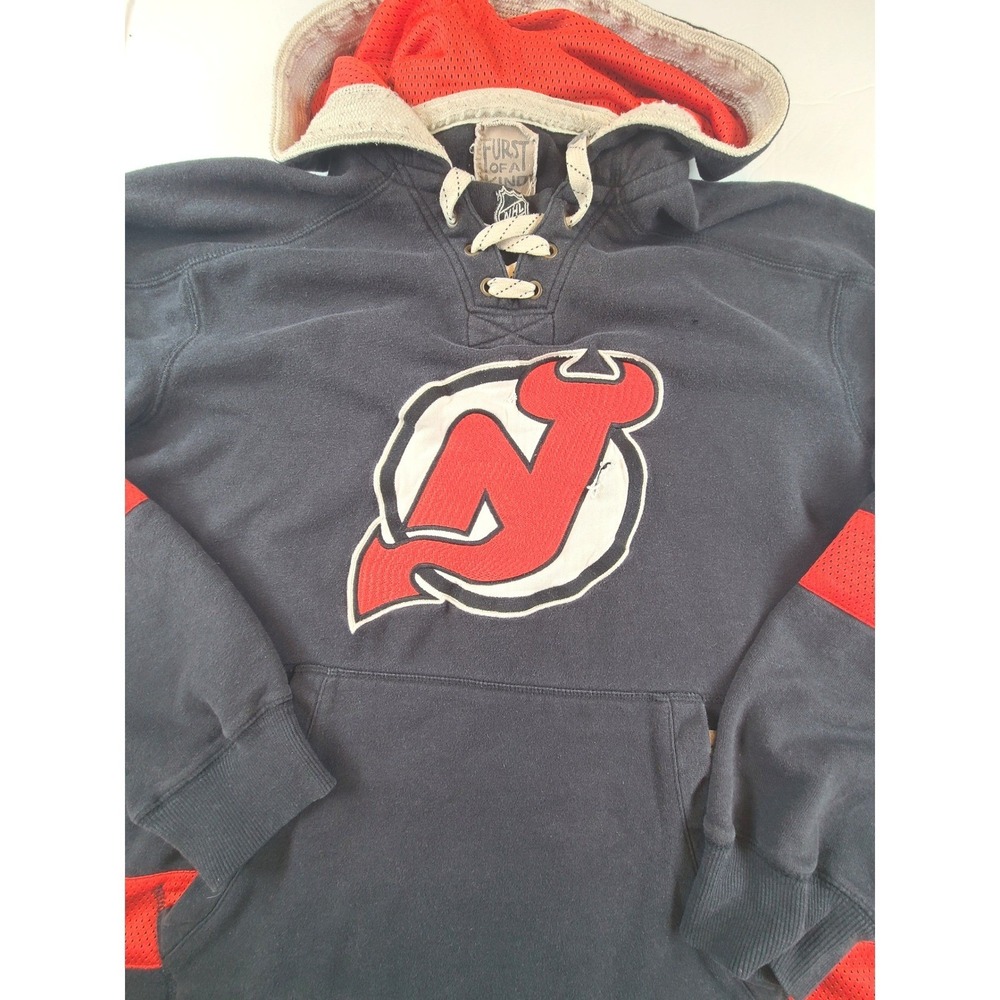 VTG CCM Furst of a Kind NHL New Jersey Devils Lace Up Hoodie Youth L Black Mesh